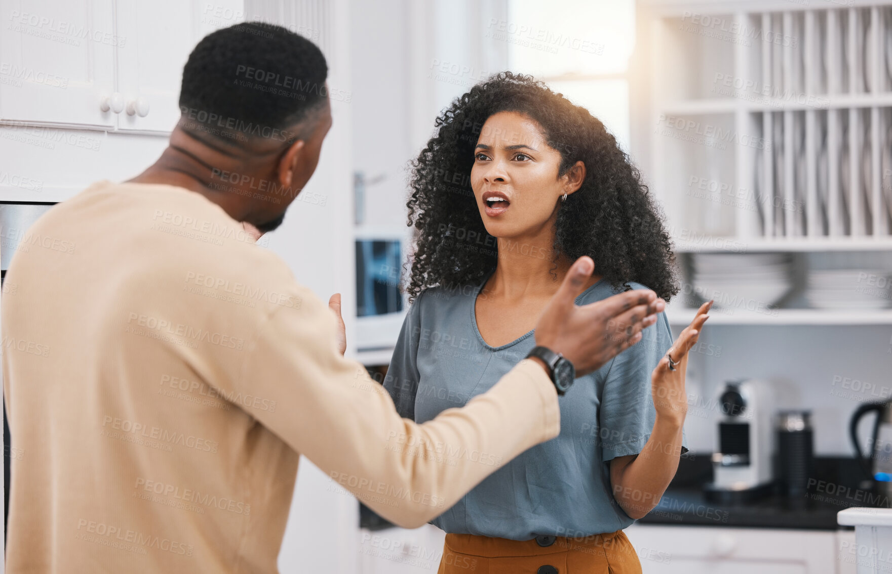 Buy stock photo Angry, fight and a couple in conflict in the house for communication about breakup or divorce. Depression, sad or a black man and woman speaking about a marriage problem, frustrated or a fail