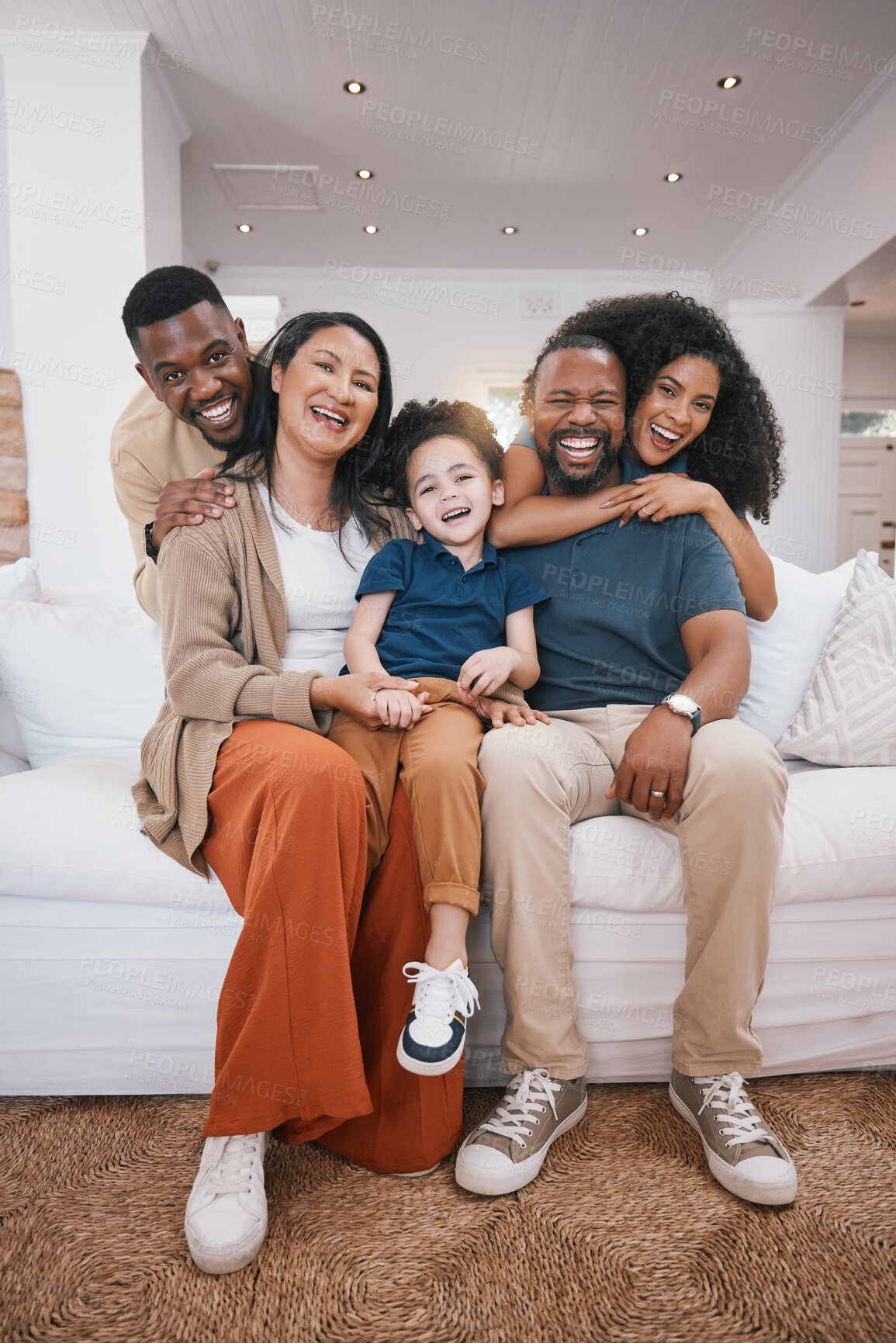 Buy stock photo Happy, portrait and family generations on a sofa hugging in the living room of modern house. Love, smile and child with parents and grandparents relaxing together in the lounge of home in Colombia.