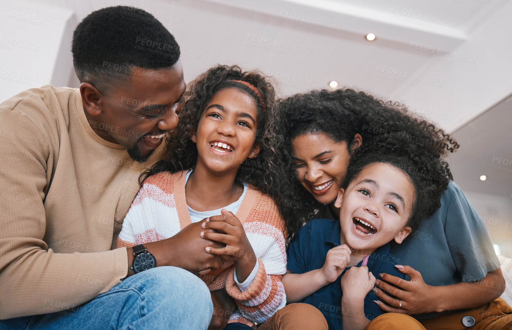 Buy stock photo Family, parents and children on sofa with smile for bonding, healthy relationship and love. Home, living room and happy mother, father and kids laughing together for happiness, joy and relax on couch