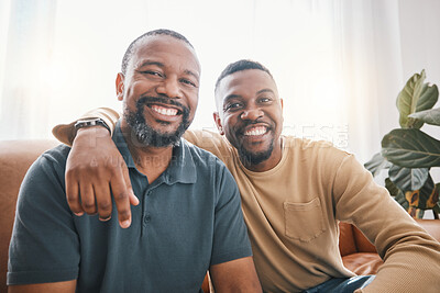 Buy stock photo Senior African dad, son and sofa for portrait, hug and smile for love, bonding or care in living room. Mature black man, fathers day and child with happy embrace, relax or excited face in family home