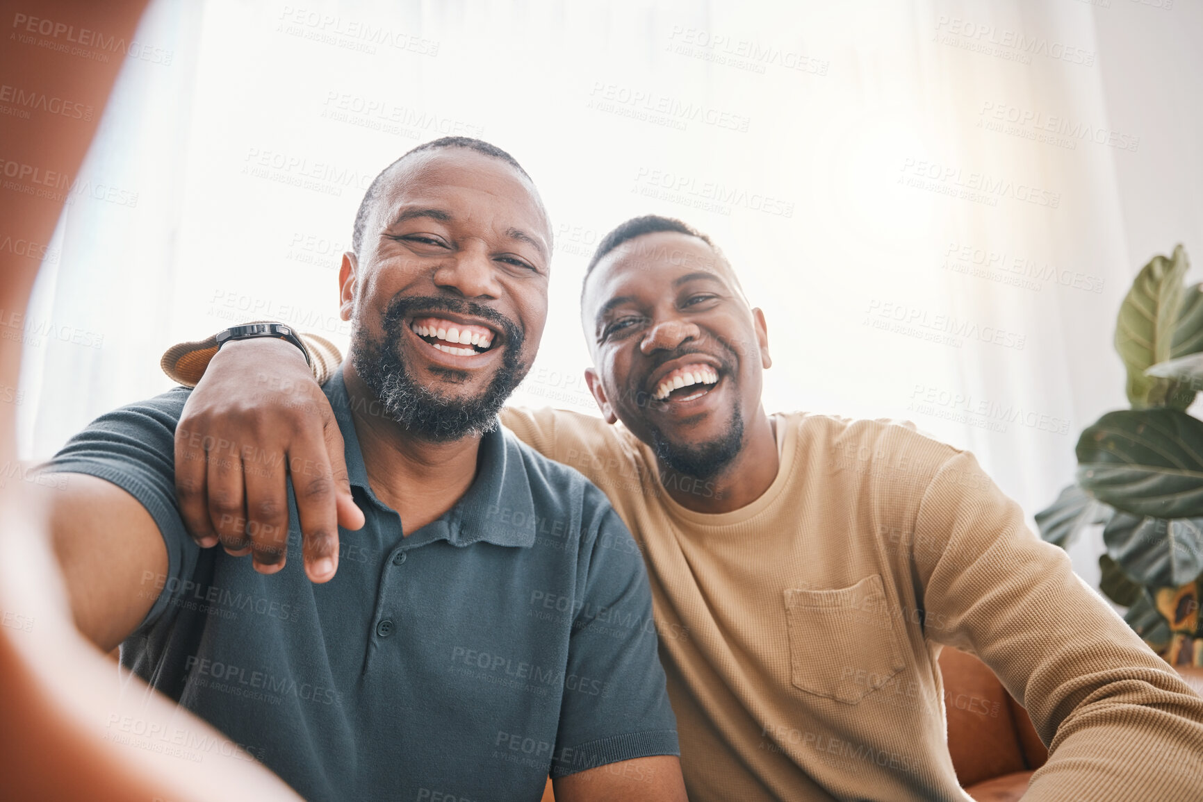 Buy stock photo Happy black man, friends and selfie in photography, bonding or friendship together on sofa at home. Portrait of African male person smile for picture, photo or memory in social media or vlog in house