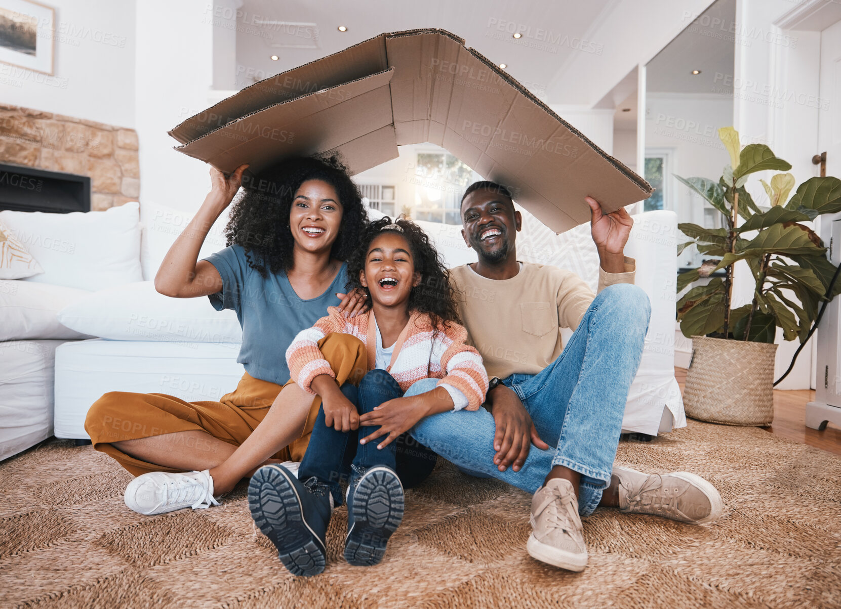 Buy stock photo Family, roof and insurance, security and protection at home with parents, child and happy in portrait. People in living room, shelter and support with safety and love, real estate  property with box