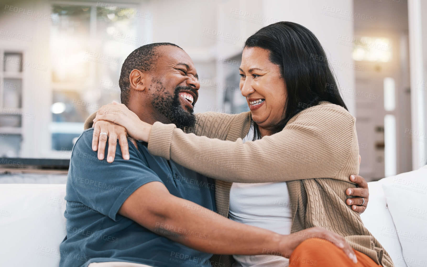 Buy stock photo Happy, hug and mature couple on sofa in living room for bonding, healthy relationship and marriage. Love, home and happy black man and woman embrace on couch for relaxing, happiness and commitment