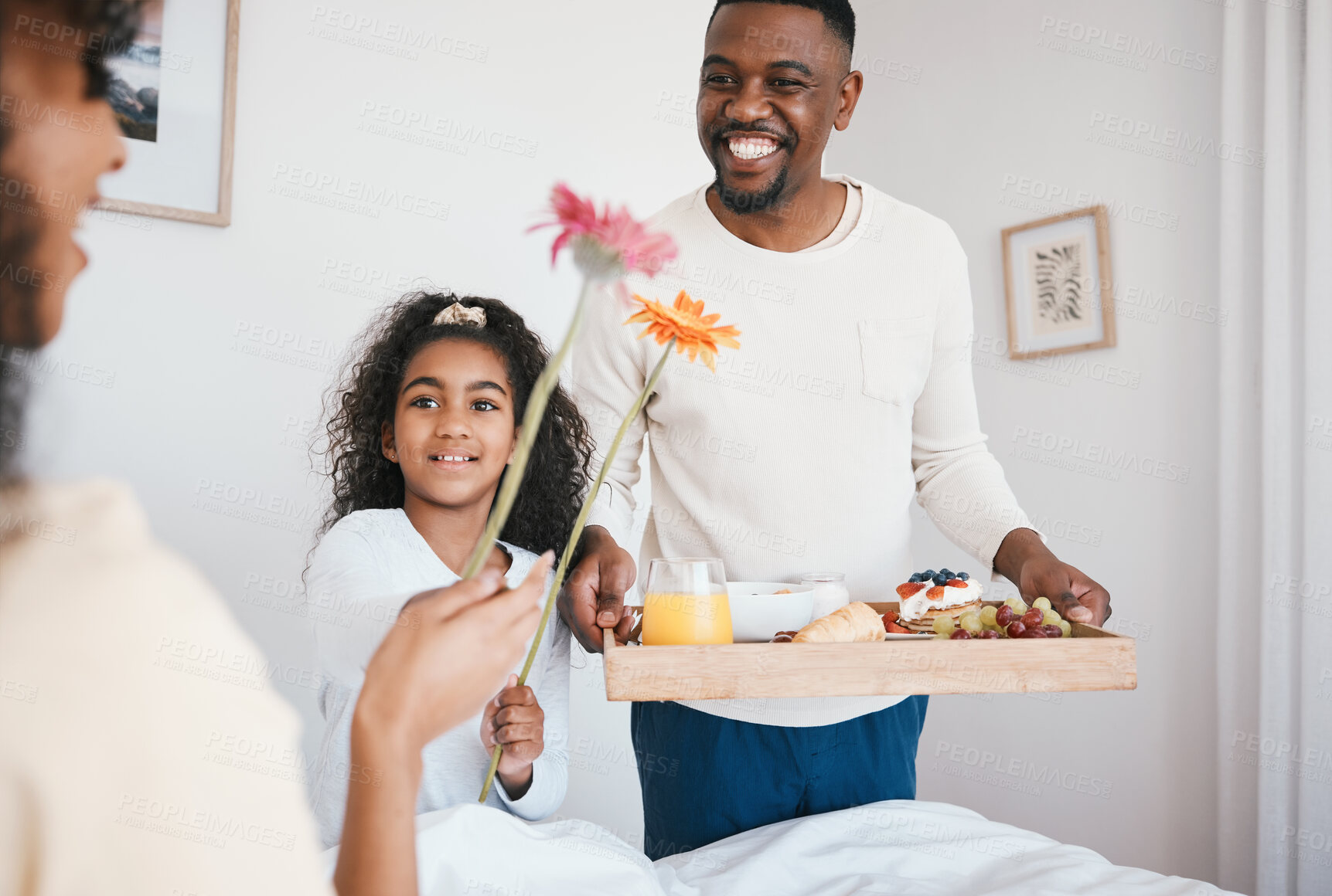 Buy stock photo Mothers day, breakfast and mom in bed with happy family with dad and child together in home with love, care and brunch tray. Surprise, father and girl with food in bedroom for special celebration