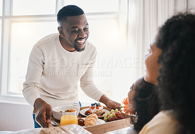 Buy stock photo Mothers day, breakfast and family in bed with happy dad, mom and child together in home with love, care and brunch tray. Father, surprise and mom with girl and food in bedroom for special celebration