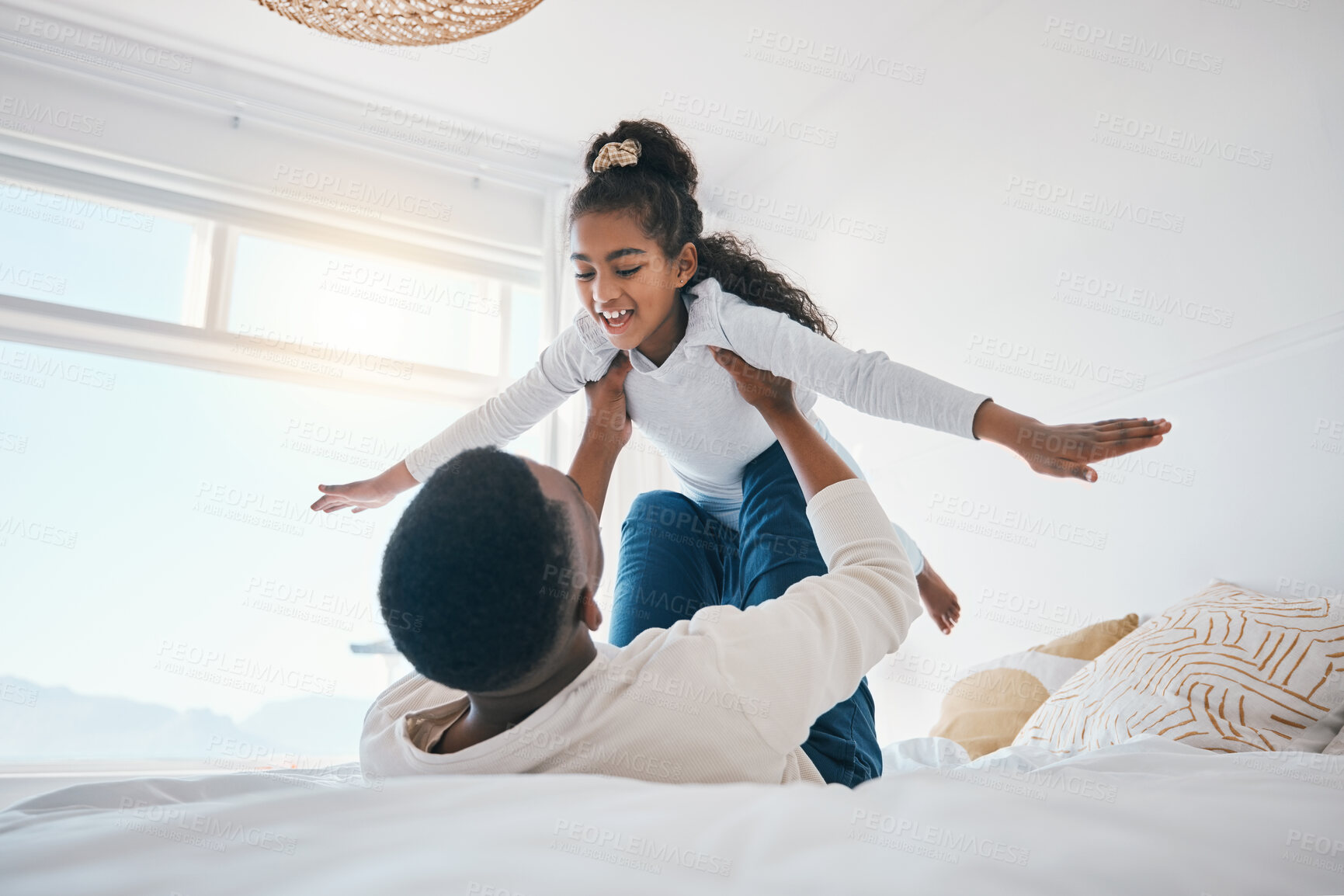 Buy stock photo Happy, airplane and father with girl child on a bed for bond, trust or support in their home together. Flying, family time and parent with kid in a bedroom for games, love or fun with weekend freedom