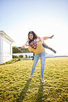 Father, girl child and piggy back for plane on grass, garden or outdoor in summer, bonding and portrait. Dad, kid and happy for game, love and care in backyard, park or field for airplane in sunshine