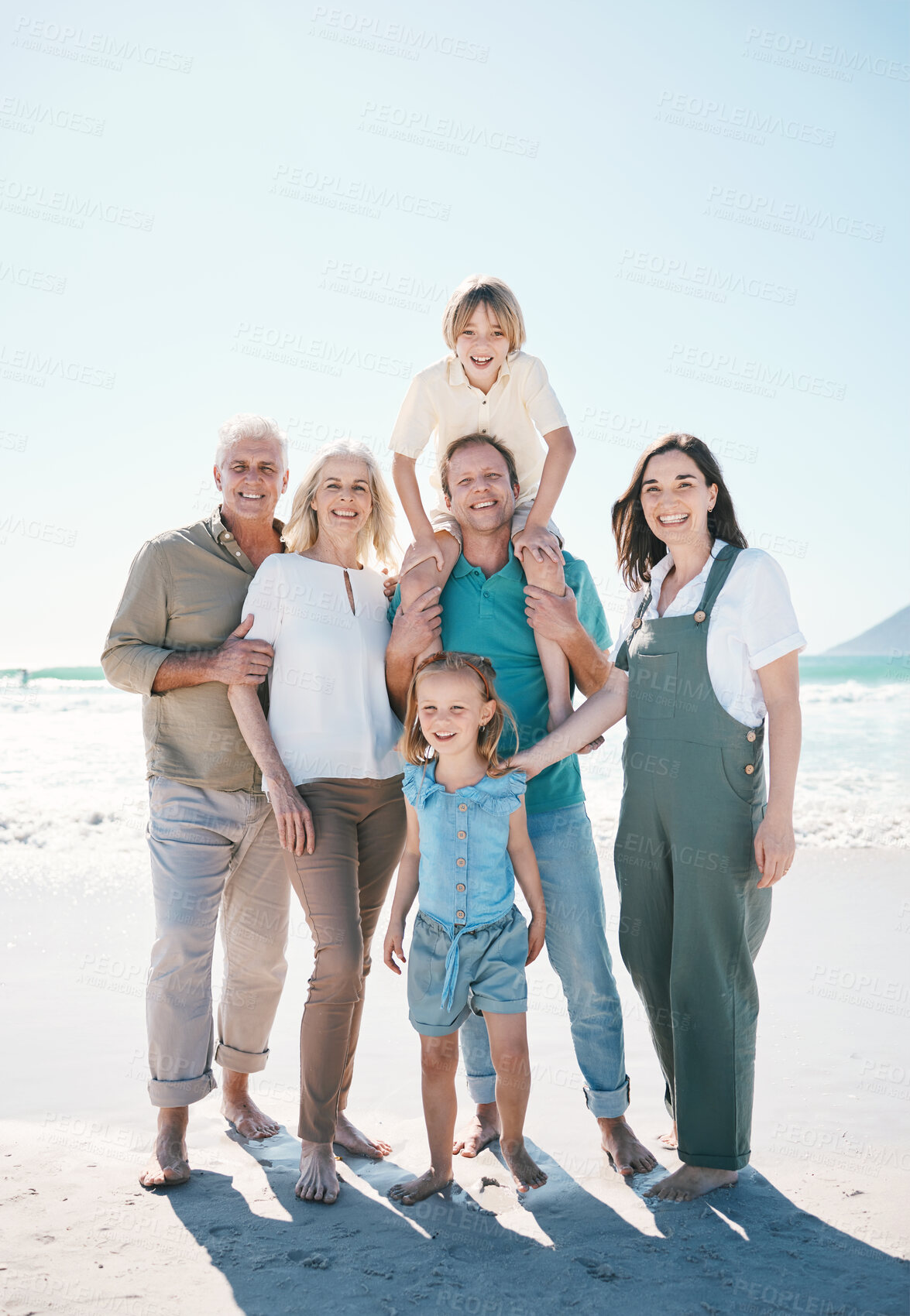 Buy stock photo Big family, grandparents portrait or happy kids at sea to relax or travel on beach holiday together. Dad, mom or children siblings love bonding with senior grandmother or grandfather in Australia