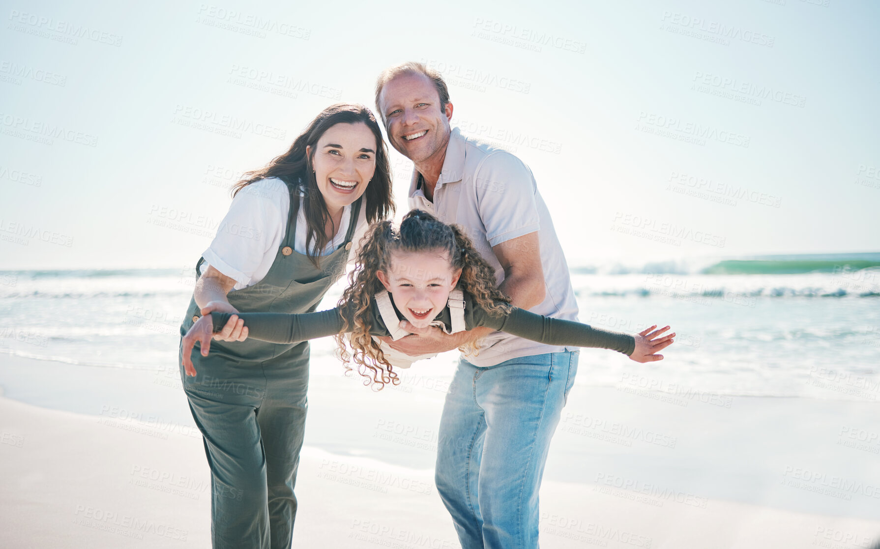 Buy stock photo Beach, plane and parents with child on holiday for bonding together on a tropical island vacation for happiness and love. Care, fun and mother playing a game with father for energy at ocean or sea