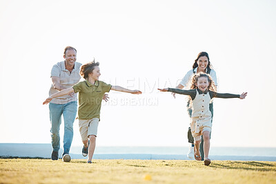 Buy stock photo Running, parents and children in nature by ocean for bonding, relationship and relax together. Family, travel and happy mother, father and kids on holiday, summer vacation and playing for adventure