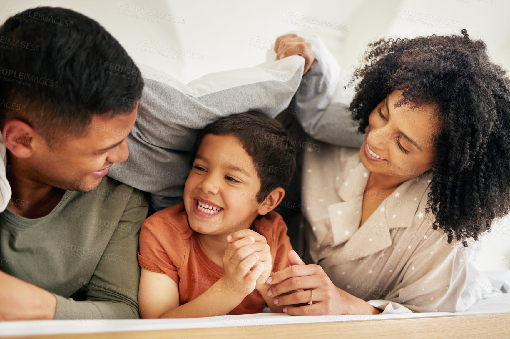 Buy stock photo Happy laugh, family and bedroom with portrait with bonding of father, mother and child smile. Home, mom and dad together with love, bonding and care in a bed in morning with kid in house with parents