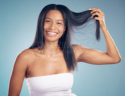 Buy stock photo Portrait, happy woman and hair in hands for beauty in studio isolated on a blue background. Face, natural hairstyle and smile of model in healthy salon treatment, wellness and care of hairdresser.