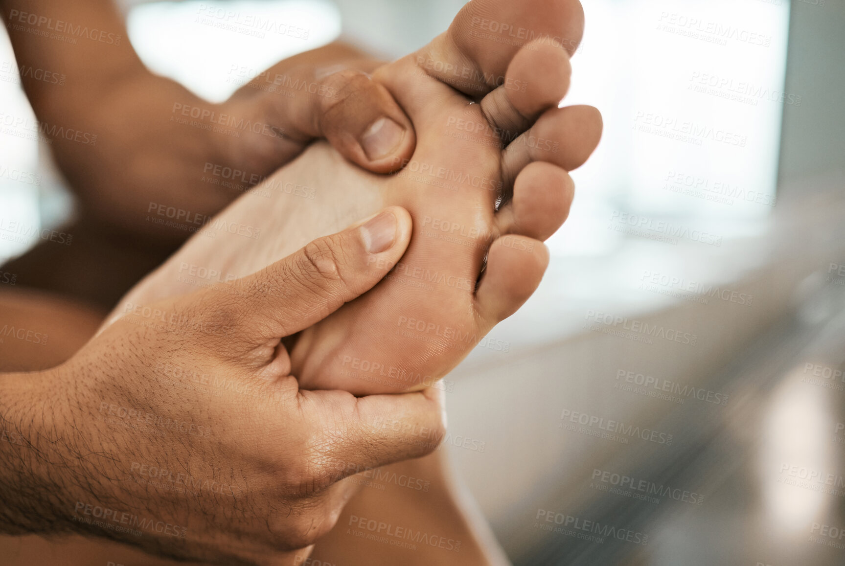 Buy stock photo Hands, foot pain and massage with a person in physiotherapy to recover from injury or accident. Rehabilitation, first aid or fitness with athlete closeup and accident for physical and emergency