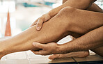 Legs injury, swimming and sports person massage calf problem from exercise, training or workout crisis, cardio or challenge. Body pain, tired athlete fatigue and sore closeup swimmer sitting on floor