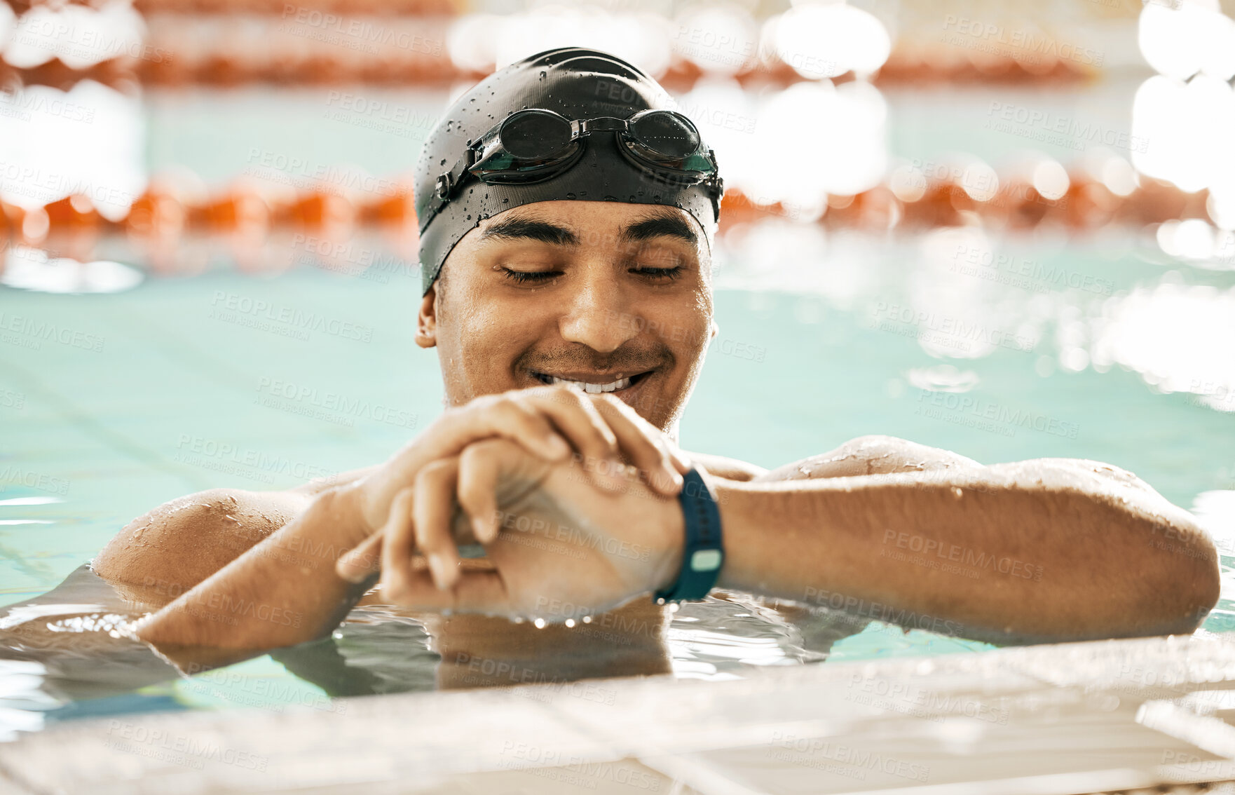 Buy stock photo Athlete man, pool and water with smart watch, check time and results for lap, speed and track progress on app. Swimming guy, stopwatch or iot clock for training, health and fitness challenge for goal