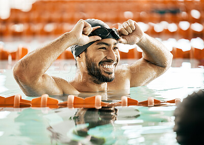 Buy stock photo Smile, sports and fitness with man in swimming pool for competition, workout and health. Wellness, happy and exercise with person training in race for performance, contest and speed challenge