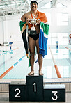 Sports man, trophy and portrait with flag for South Africa, pride and success by pool, competition and challenge. Swimming athlete, champion and winner with celebration, goals and pride on podium