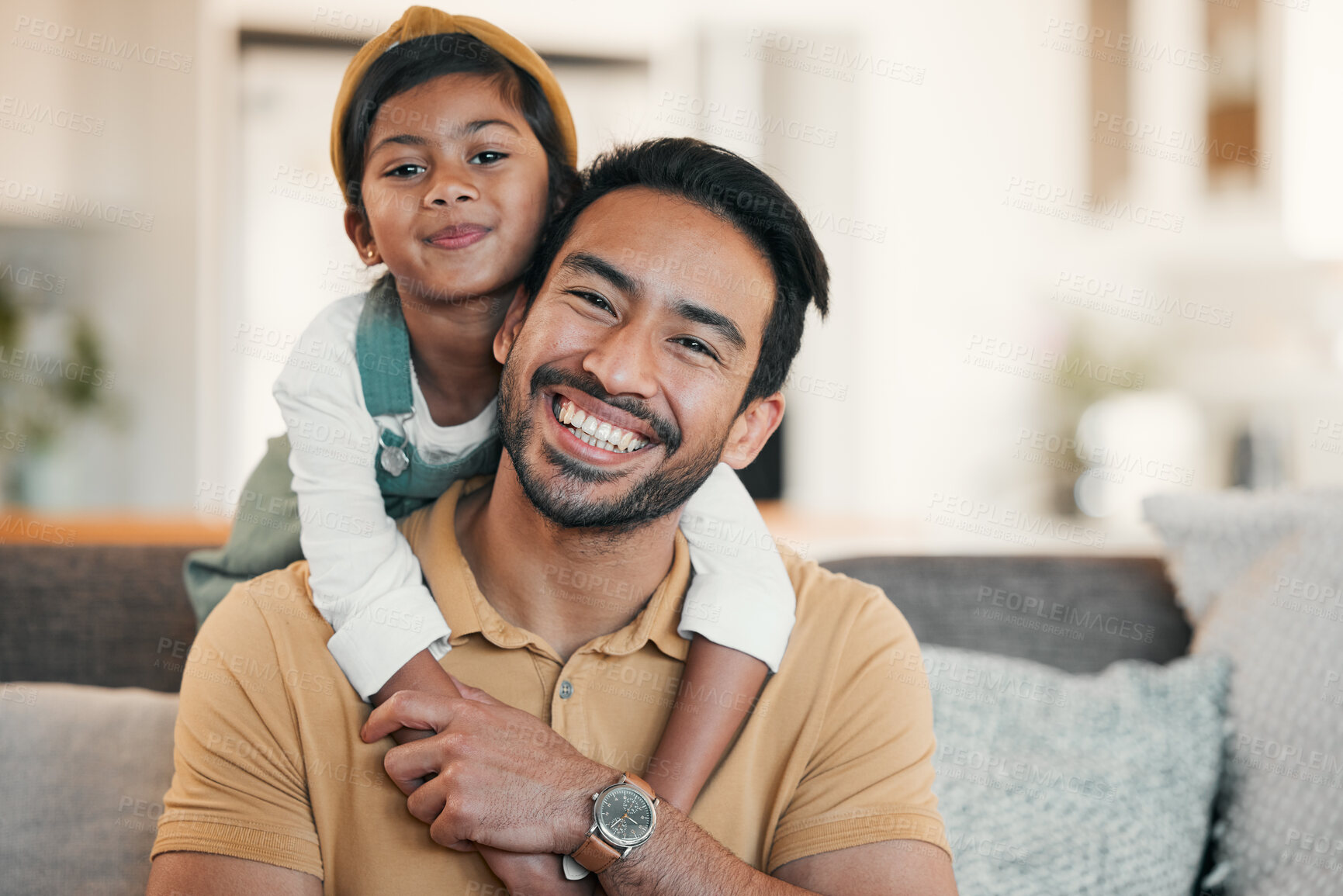 Buy stock photo Portrait, home and father with girl, hug and bonding with happiness, weekend break and love in a lounge. Face, family and single parent with child, dad and kid on a couch, relax and rest with care