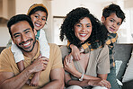 Portrait of parents, kids and hug on sofa together, love and happy family fun in living room of home. Mom, dad and children embrace on couch with support, trust and smile with bonding in apartment.