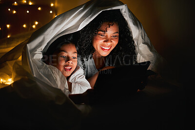 Buy stock photo Night, tablet and mother with child in bedroom with fairy lights for bedtime story, movies and online games. Happy family, reading and mom and kid on digital tech for bonding, love and care in home