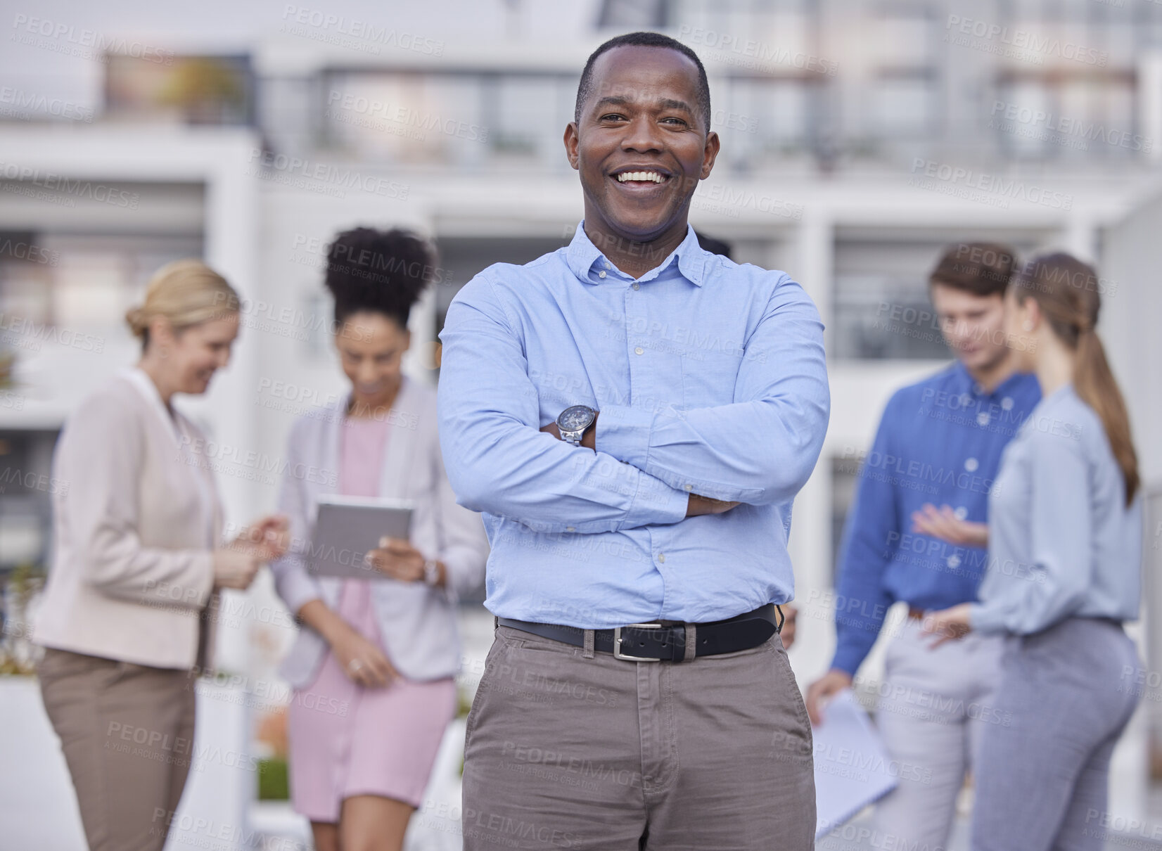 Buy stock photo Black man, portrait and hands crossed for leadership and teamwork outside office building with collaboration. Business, people and professional employee in human resources and corporate startup
