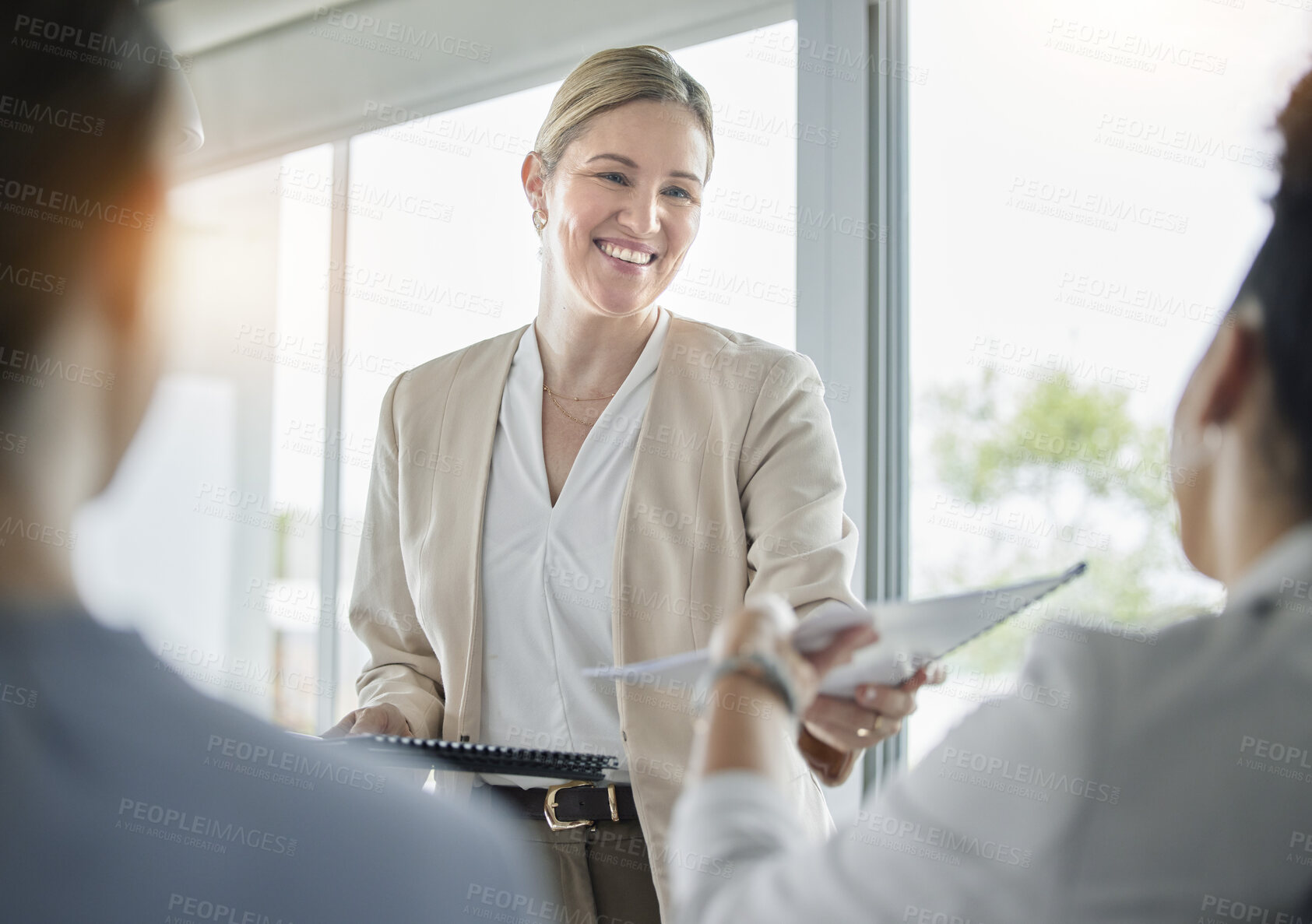 Buy stock photo Manager, documents and planning and woman in meeting for strategy, data and research. Workshop, review and brainstorming with employees in office for collaboration, feedback and finance portfolio