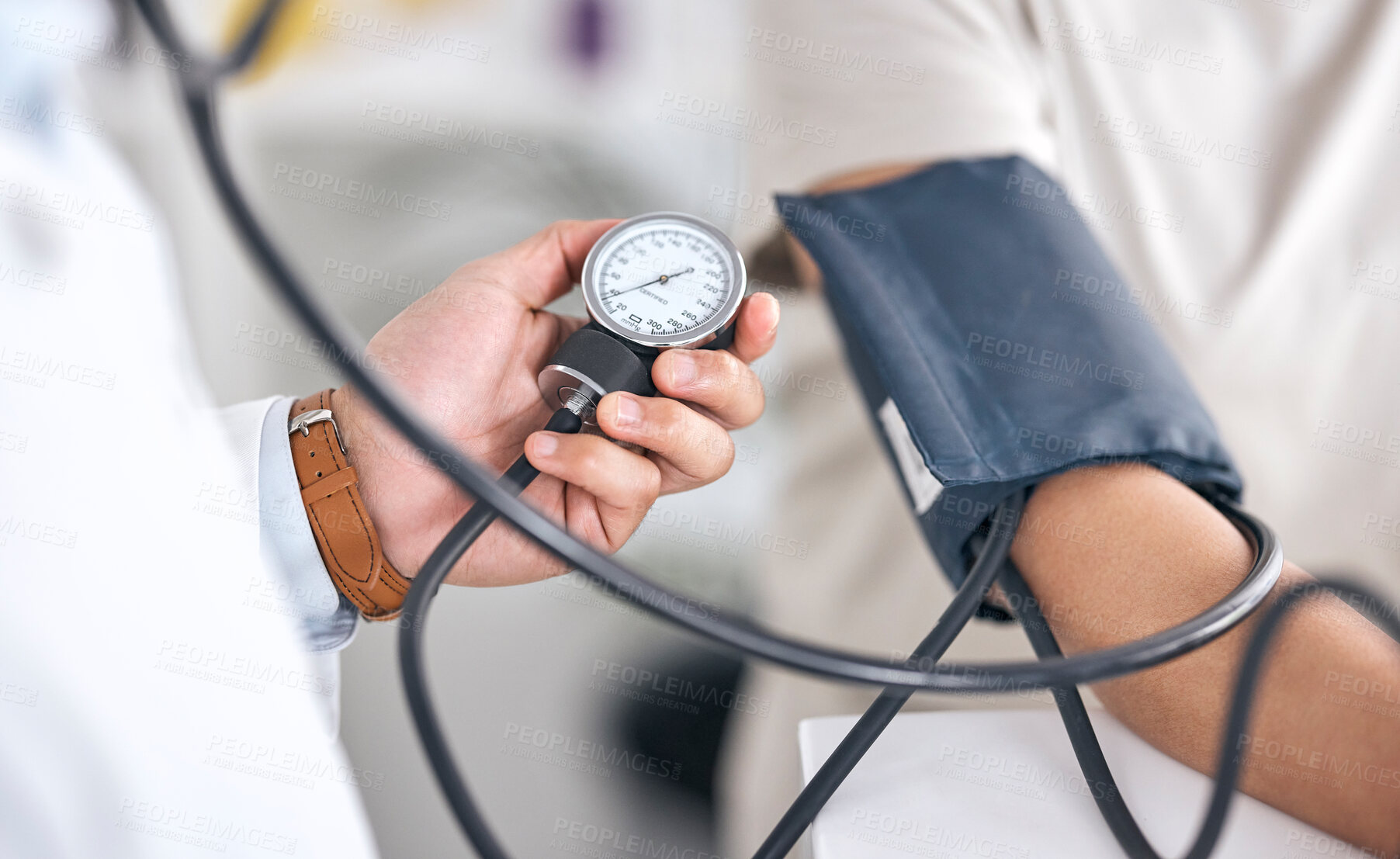 Buy stock photo Hands, blood pressure and doctor with patient in consultation at hospital in clinic test. Hypertension, exam and arm of person with medical professional for check up for heart health, advice and care