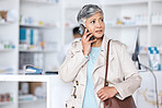 Phone call, pharmacy and shopping with woman in store for search, product and medicine consulting. Communication, healthcare and contact with mature customer for medical, wellness and prescription