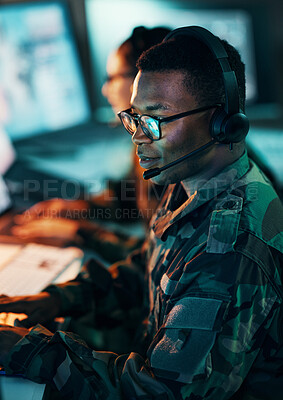 Buy stock photo Military, call center and man on computer in office, data center and monitor for technical support, cybersecurity or surveillance. Army, officer and work in tech, security or government communication