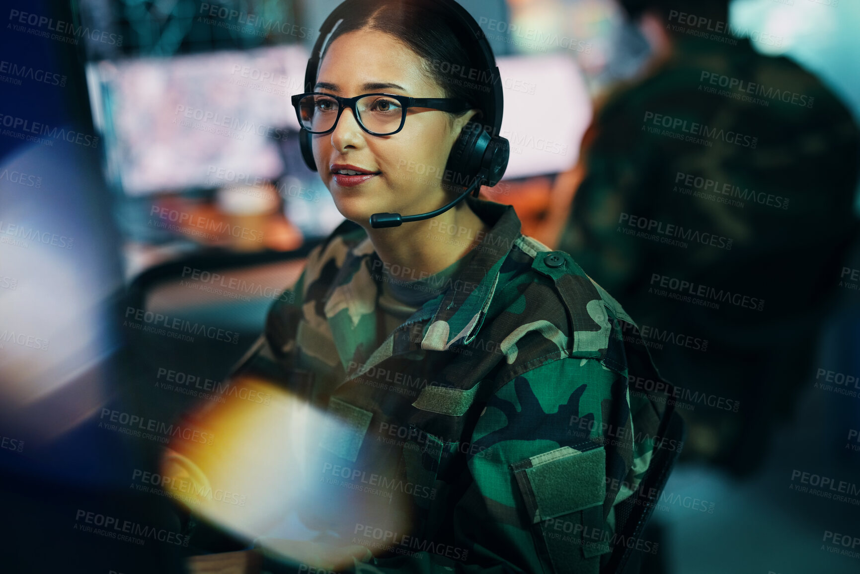 Buy stock photo Army command center, computer and woman in headset, global surveillance and tech for communication. Security, intelligence and soldier at desk in military office at government cyber data control room