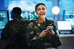 Portrait, phone and woman in a military control room for strategy as a soldier in uniform during war or battle. Mobile, happy and a young army person in an office for support, surveillance or service