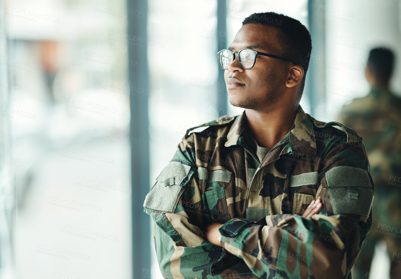 Buy stock photo Confident soldier thinking, mockup and arms crossed in army building, pride and professional hero service. Military career, security and courage, black man in camouflage uniform at government agency.