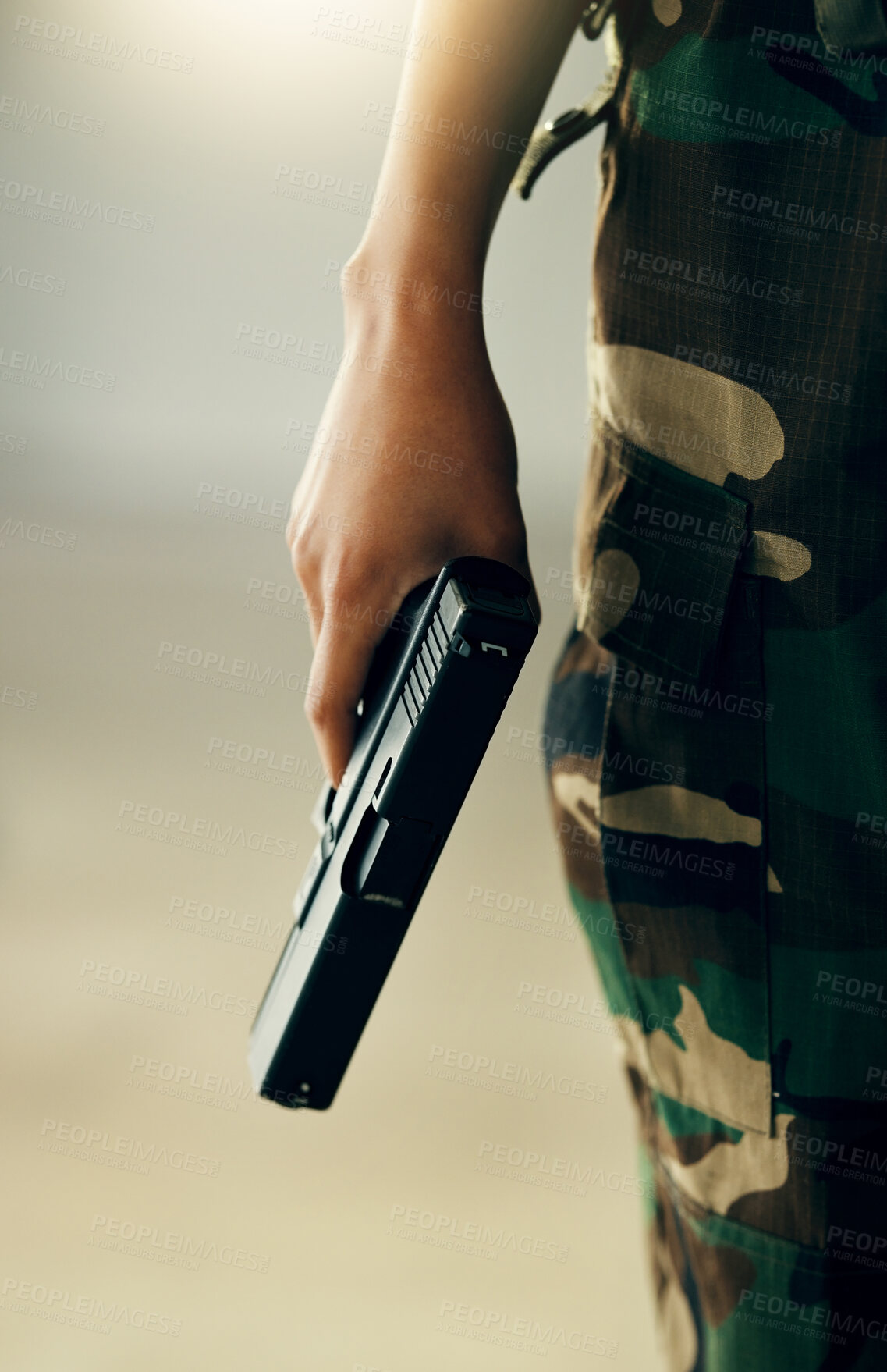 Buy stock photo Hand, gun and a soldier closeup on the battlefield during war or combat training for the military. Army, warrior or hero and a person in camouflage uniform with a pistol, firearm or weapon for safety