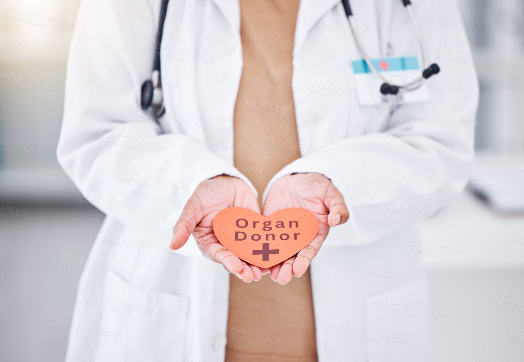 Buy stock photo Organ donor, doctor and hands with heart sign for medical service, donation and transplant charity. Healthcare, hospital and health worker with emoji, shape and icon for help, support and medicine