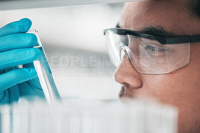 Buy stock photo Science, research and man looking at test tube in laboratory, solution for vaccine or medical innovation. Healthcare, biotech lab analytics and medicine, scientist with pharmaceutical sample in glass