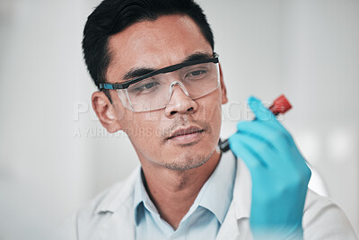 Buy stock photo Scientist, face and man with blood test in laboratory for medical investigation, healthcare research and vaccine. Science, asian worker and red tube for dna analysis, development or chemistry results