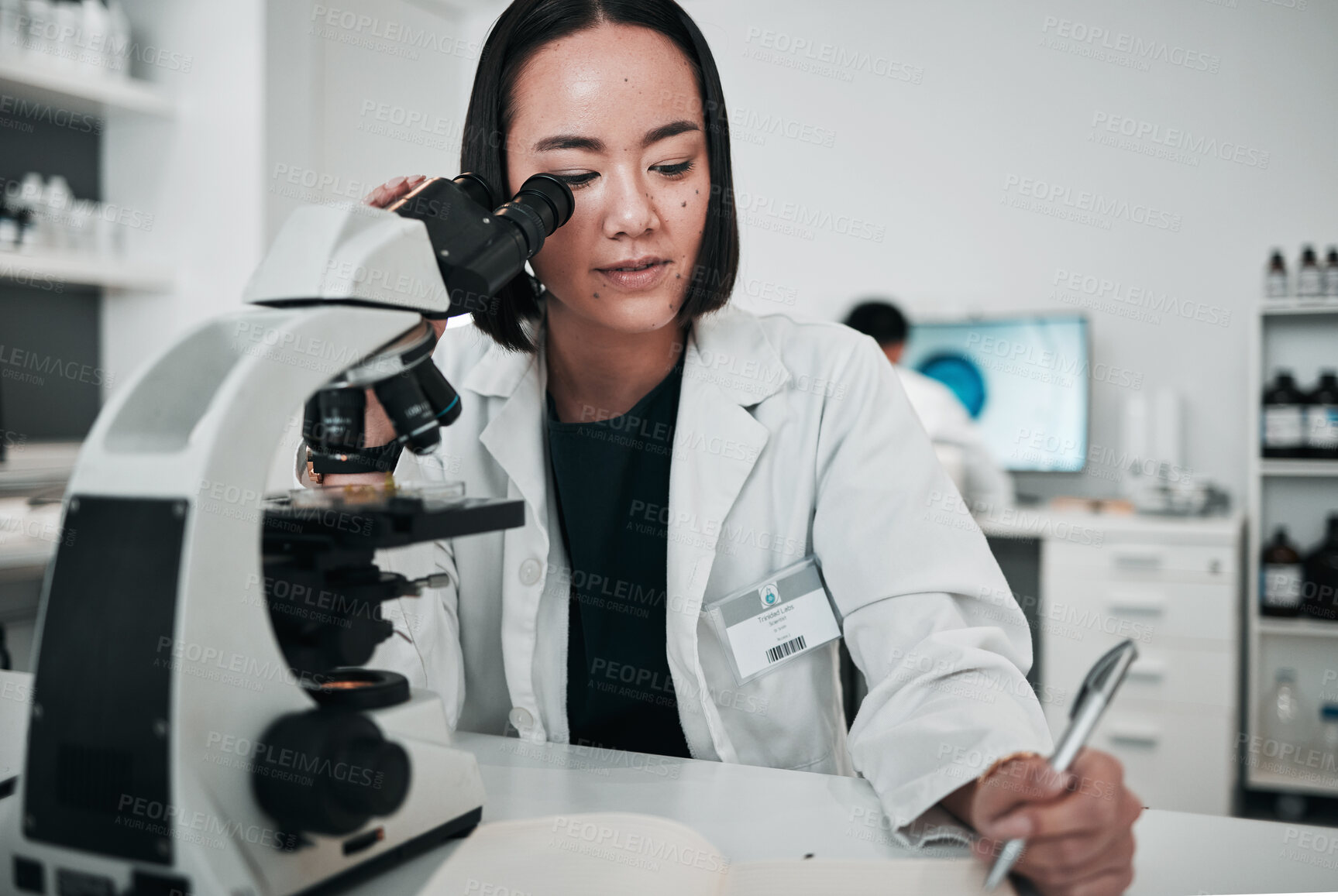 Buy stock photo Microscope, woman and writing in laboratory for science research, dna analysis and notes. Asian scientist, biotechnology and review investigation, test report and check lens for assessment results 