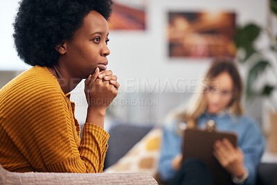 Buy stock photo Mental health, anxiety and psychology with a black woman in therapy, talking to a professional. Depression, stress or support with a young patient in session with a psychologist for grief counseling 