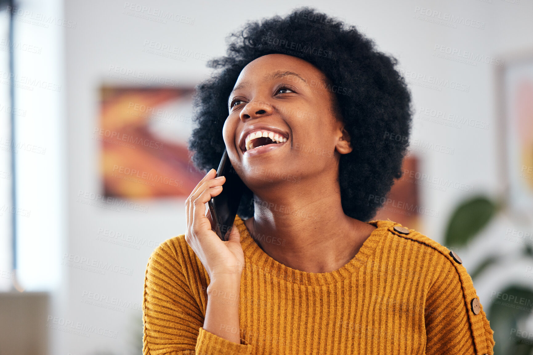 Buy stock photo Funny black woman in phone call, talking and conversation with contact at home. African person laughing on smartphone, listening to comedy and news in discussion of meme, communication and excited