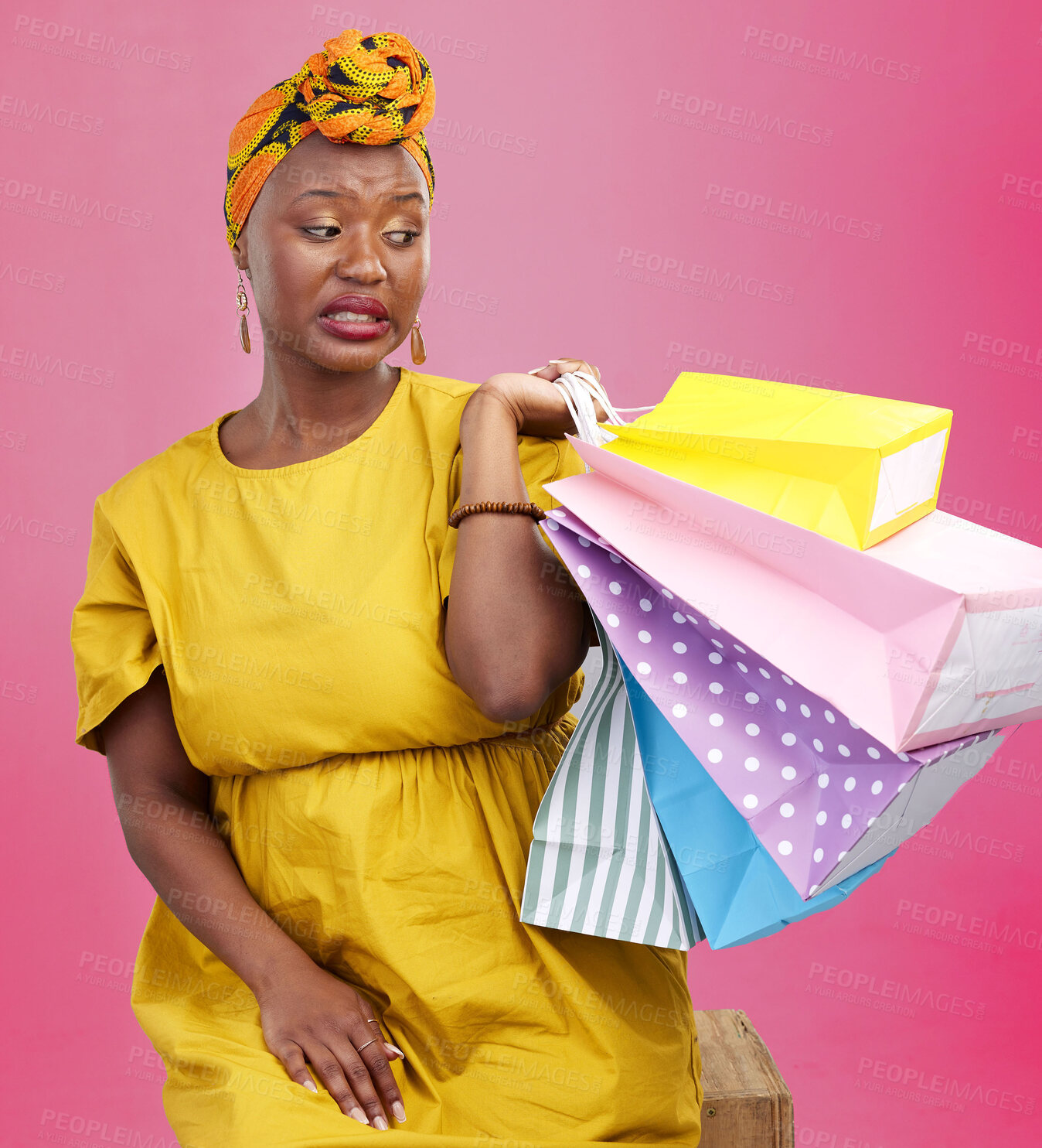 Buy stock photo Studio bag, shopping problem or black woman with bad shop product, boutique crisis or shopaholic. Facial expression, mistake or African customer disappointed with retail present on pink background