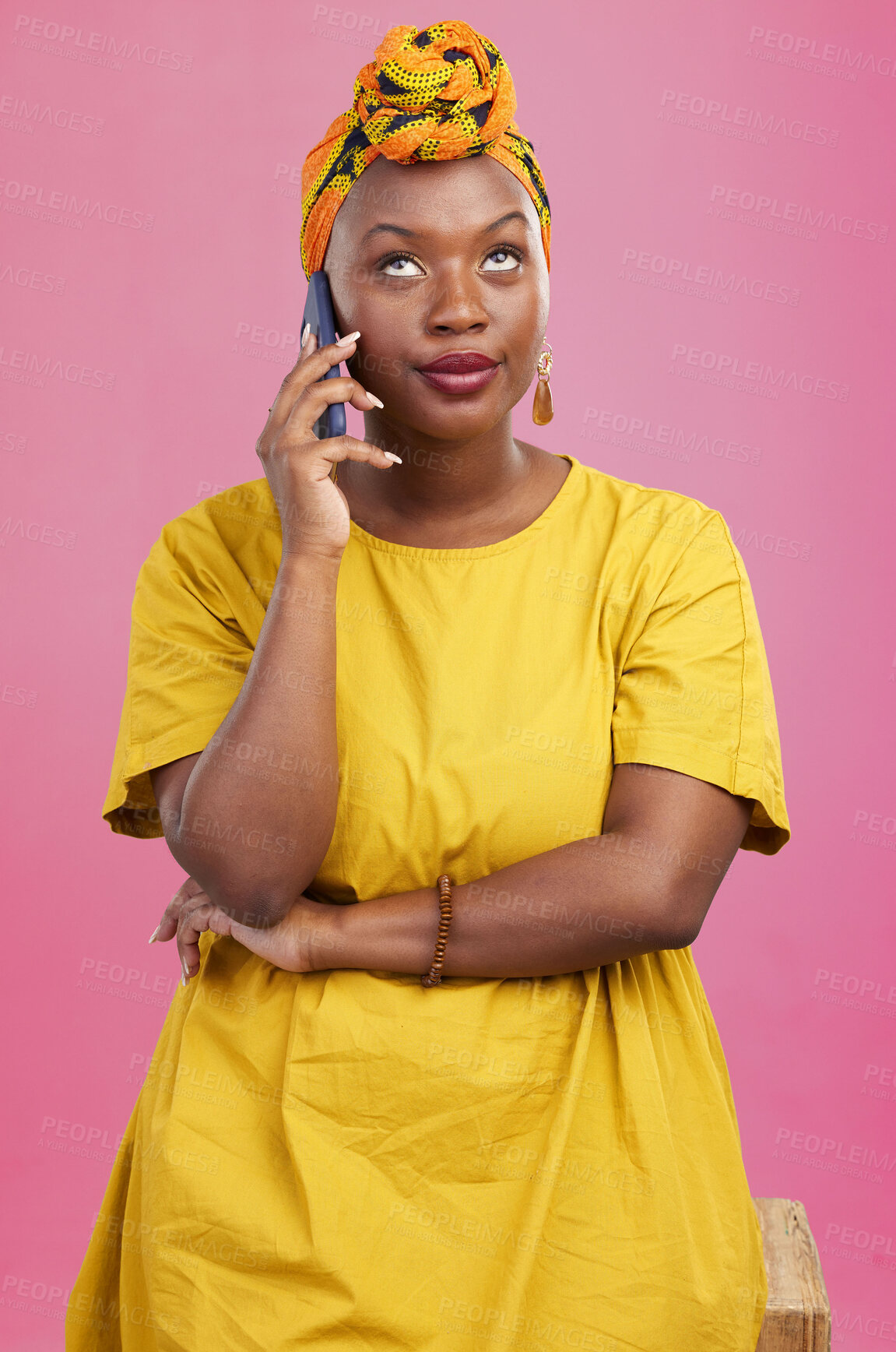 Buy stock photo Face, phone call and black woman in studio frustrated by phishing, scam or telemarketing spam on pink background. Smartphone, conversation and African female with eye roll emoji or annoyed attitude