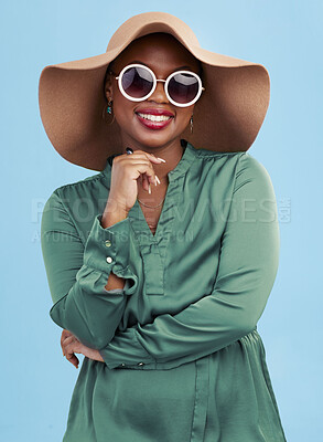 Buy stock photo Fashion, sunglasses and portrait of black woman with smile for summer style isolated in a studio blue background. African, hat on young person travel with clothes for glamour  or vacation accessories