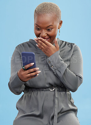 Shocked, surprise and black woman excited for mobile app deal isolated in studio blue background with prize. Giveaway, African and happy person with promotion, bonus and competition notification