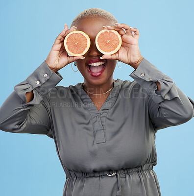 Buy stock photo Happy black woman, orange and vitamin C in diet, natural nutrition or detox against a studio background. Portrait of African female person smile with healthy organic citrus fruit for body wellness