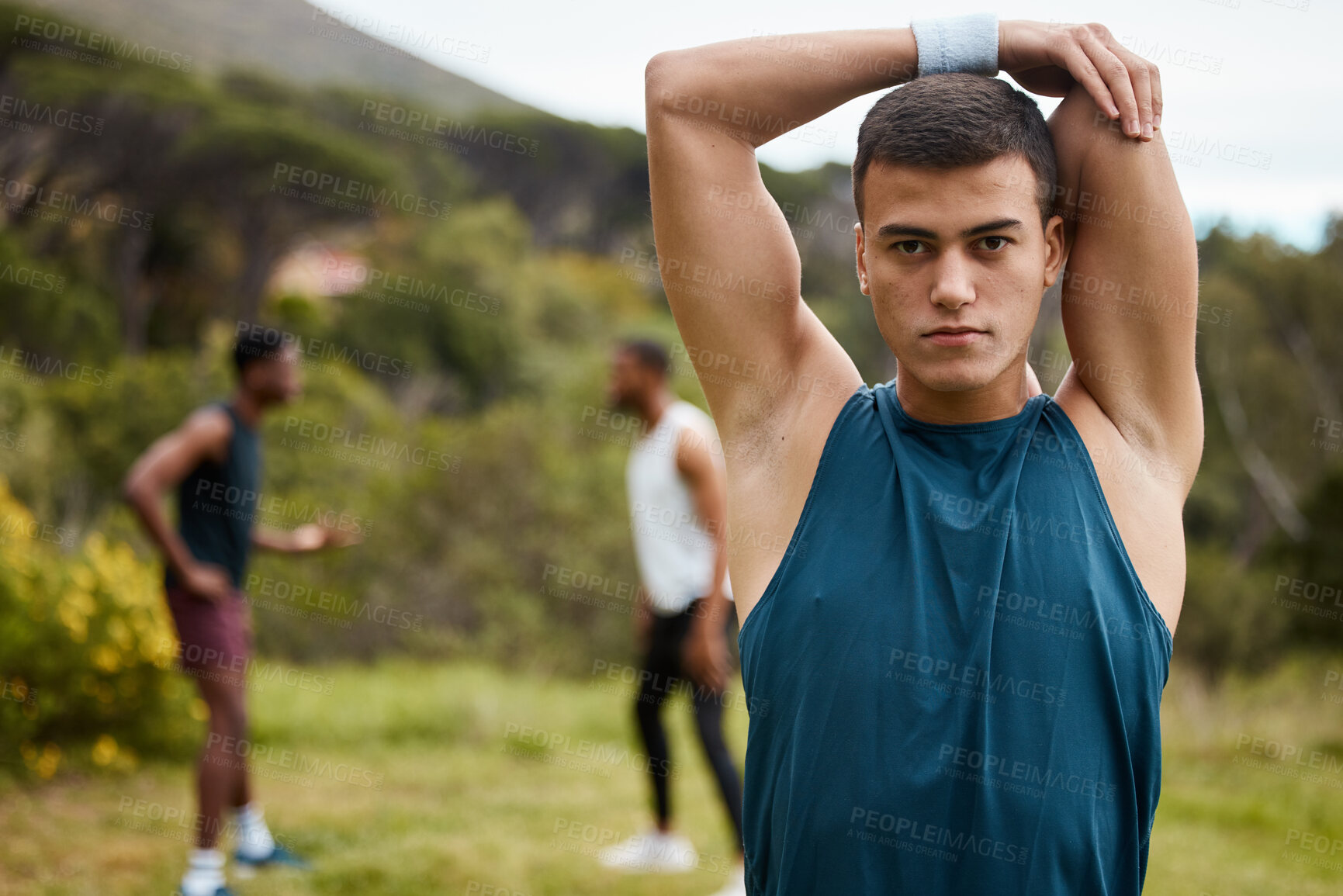 Buy stock photo Stretching, fitness and portrait of a man outdoor for health and wellness. Serious runner, athlete or sports person in nature park to start exercise, workout or training with arm muscle warm up