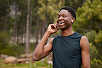 Fitness, listening to music and man outdoor for wellness, banner and thinking. Happy runner, athlete or african sports person in nature to start exercise, workout or training and earphones streaming