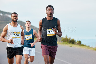 People, fitness and running on mountain for marathon, sports or outdoor race together in nature. Group of athletic runners on road in cardio workout, training or exercise for competition or triathlon