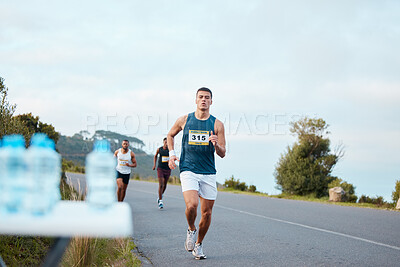 Man, fitness or running on road in marathon, healthy challenge or outdoor sports race performance. Water bottle, athlete or runner on street in workout, training or exercise for triathlon competition