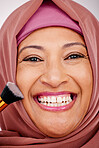 Makeup brush, smile and portrait of muslim woman in studio for cosmetic, natural and face routine. Happy, self care and mature islamic female model with cosmetology tool for facial glamour treatment.