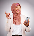 Phone, muslim and woman with smile in studio for social media scroll, internet post or mobile app on gray background. Smartphone, islam and person with happiness for technology, digital web or joy
 
